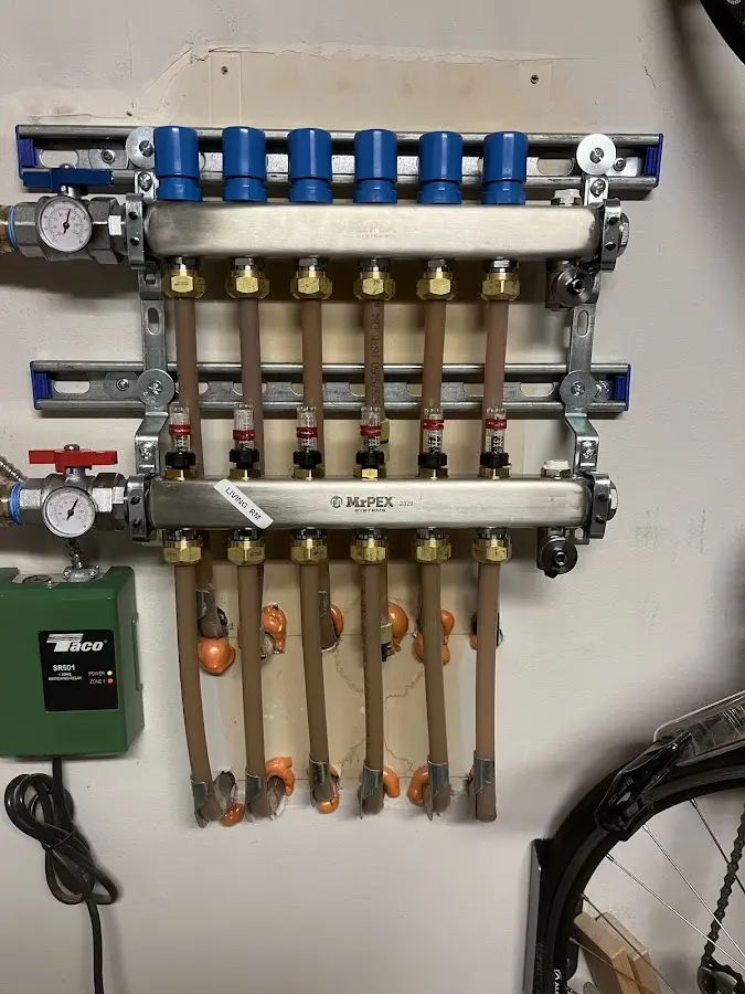 Plumber performing Water Heater Repair at a residential property in Roseland